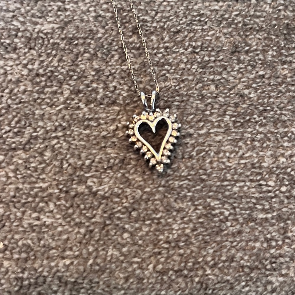 Hurdles Jewelry heart diamond necklace on silver chain.